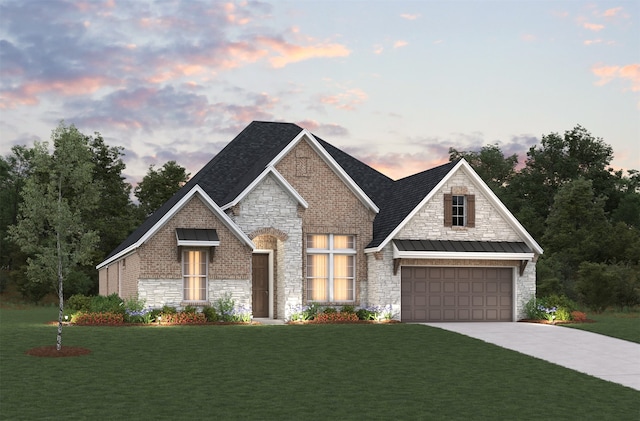 view of front of property with a standing seam roof, a lawn, concrete driveway, and metal roof