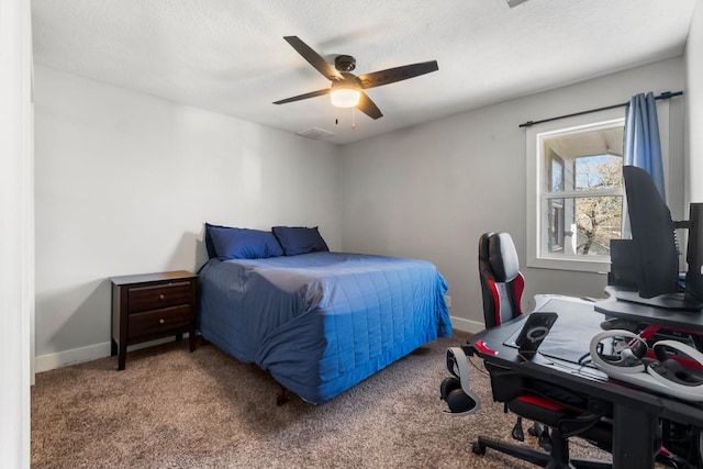 bedroom featuring carpet floors, ceiling fan, a textured ceiling, and baseboards