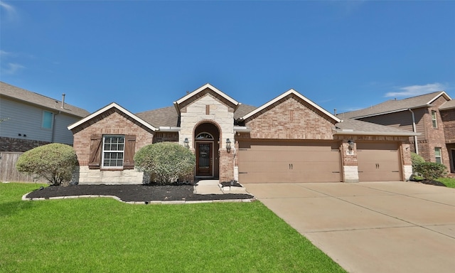 view of front of property featuring an attached garage, brick siding, a shingled roof, concrete driveway, and a front lawn