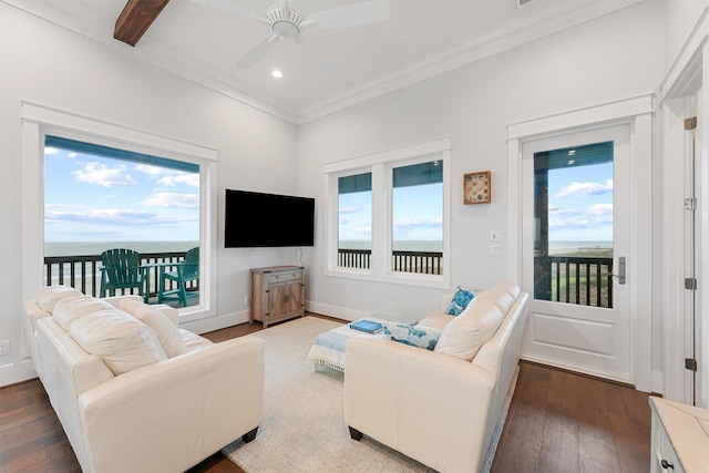 living room featuring baseboards, crown molding, hardwood / wood-style floors, and ceiling fan