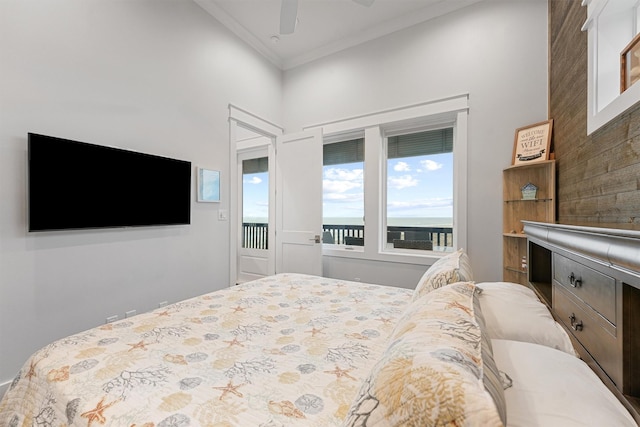 bedroom with a ceiling fan and crown molding