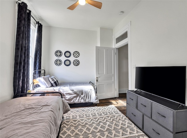 bedroom featuring ceiling fan and wood finished floors