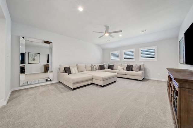 living area with a ceiling fan, recessed lighting, visible vents, and light carpet