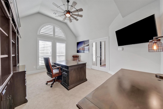 home office featuring a wealth of natural light, french doors, light carpet, and vaulted ceiling