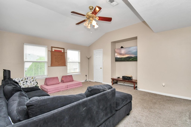 carpeted living room featuring ceiling fan, baseboards, visible vents, and vaulted ceiling