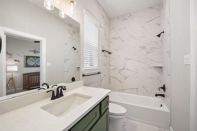 full bath featuring shower / bath combination, marble finish floor, toilet, and vanity