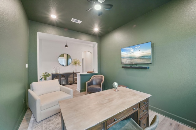 office area with light wood finished floors, baseboards, visible vents, ceiling fan, and recessed lighting