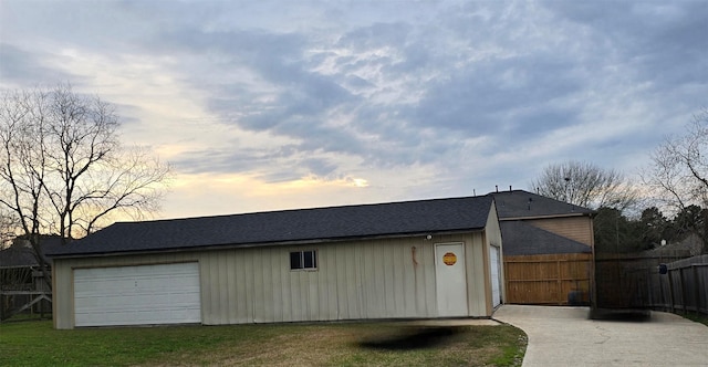 garage with fence