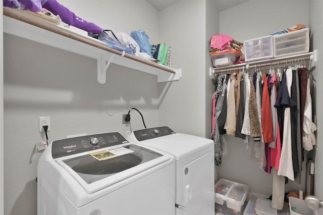 laundry room featuring laundry area and separate washer and dryer