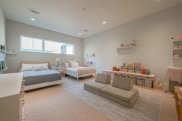 bedroom with carpet, visible vents, and recessed lighting