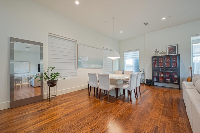 dining area featuring recessed lighting, a healthy amount of sunlight, visible vents, and wood finished floors