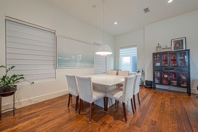 dining room with recessed lighting, visible vents, baseboards, and wood finished floors