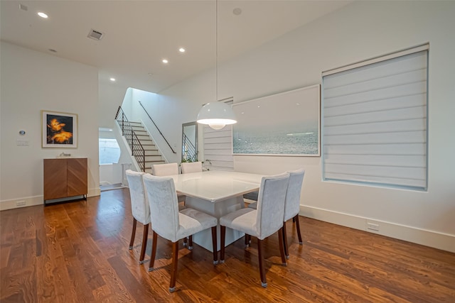 dining space with baseboards, visible vents, dark wood finished floors, stairway, and recessed lighting