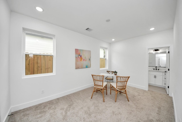 dining area with recessed lighting, visible vents, baseboards, and light colored carpet