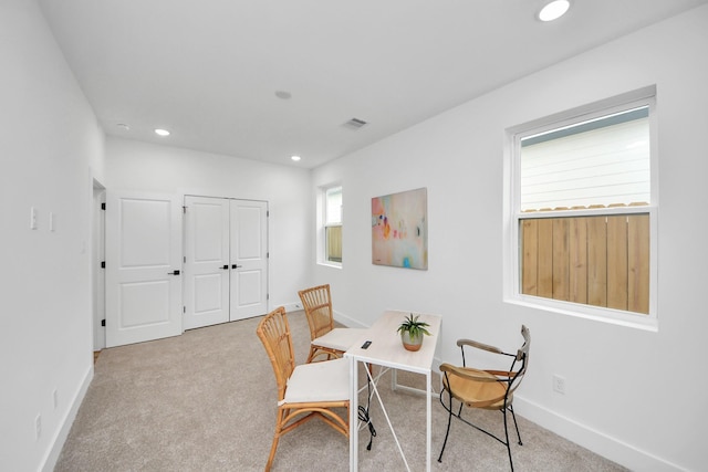 dining space featuring baseboards, carpet flooring, and recessed lighting