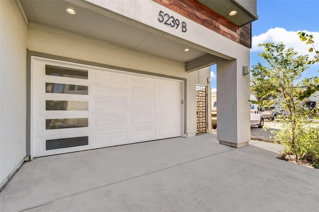 garage featuring driveway