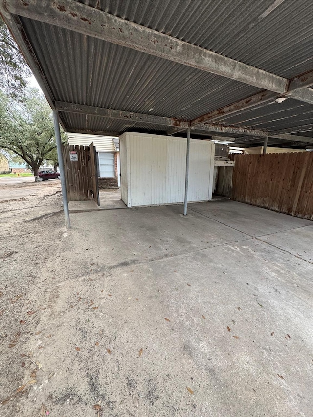 garage featuring covered parking