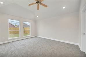 unfurnished room featuring vaulted ceiling, recessed lighting, carpet flooring, and baseboards