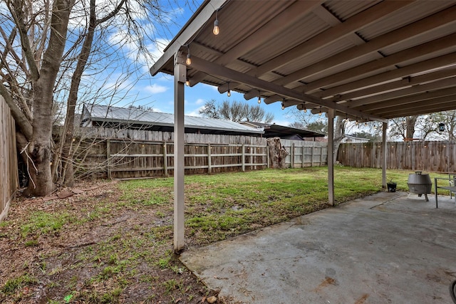 view of yard featuring a fenced backyard and a patio