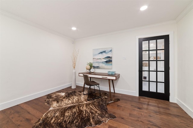 foyer featuring wood finished floors, baseboards, and ornamental molding