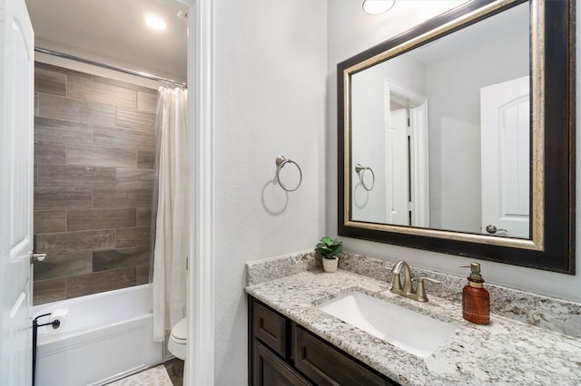 full bath with vanity, toilet, and shower / tub combo with curtain