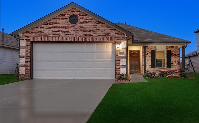 view of front facade with brick siding, a shingled roof, an attached garage, a front yard, and driveway