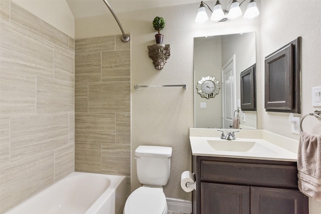 bathroom featuring shower / bathtub combination, vanity, and toilet