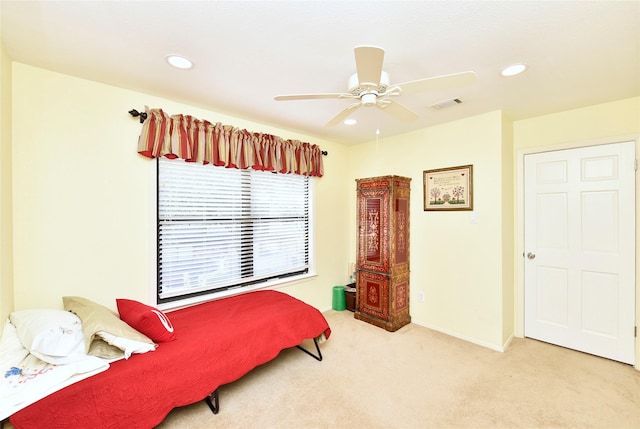 carpeted bedroom featuring baseboards, visible vents, a ceiling fan, and recessed lighting