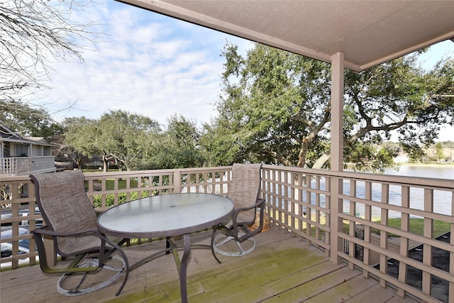 deck featuring a water view