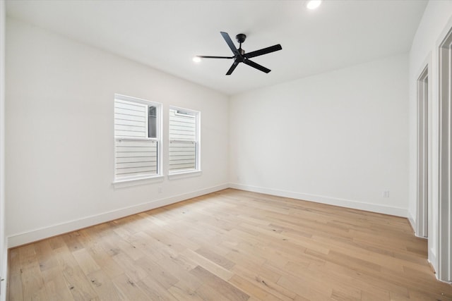 empty room with a ceiling fan, recessed lighting, baseboards, and light wood finished floors