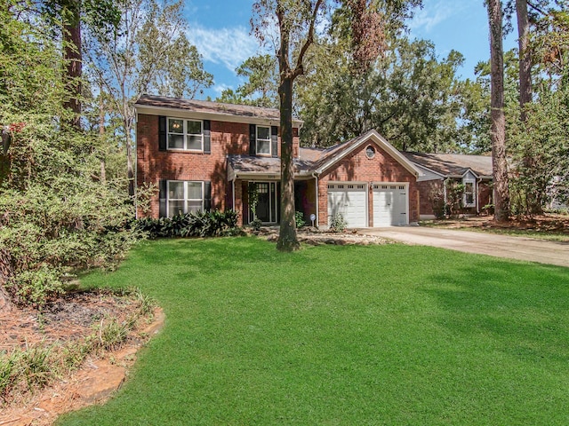 view of front facade featuring a garage, driveway, a front lawn, and brick siding