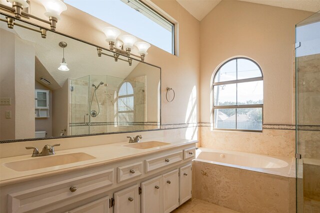 full bathroom with lofted ceiling, a sink, toilet, and a shower stall