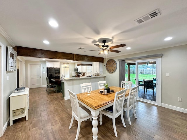 dining area with recessed lighting, visible vents, baseboards, ornamental molding, and dark wood-style floors