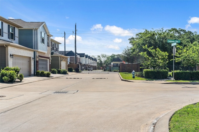 view of road featuring curbs and a residential view