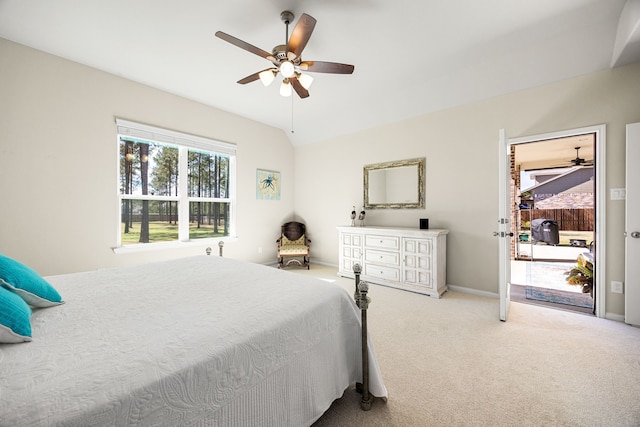 carpeted bedroom with lofted ceiling, ceiling fan, and baseboards