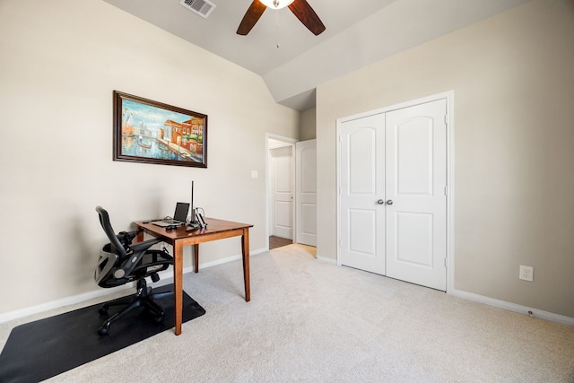 office with lofted ceiling, ceiling fan, visible vents, and light colored carpet