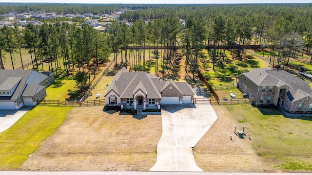 bird's eye view with a forest view