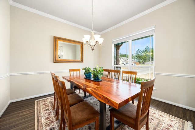 dining room featuring crown molding, a notable chandelier, dark wood finished floors, and baseboards