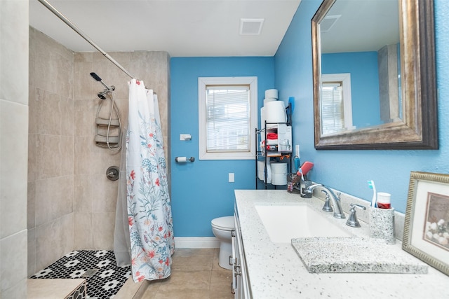 full bathroom featuring visible vents, toilet, tiled shower, tile patterned floors, and vanity