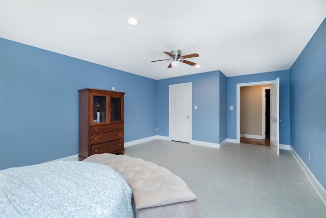 bedroom with recessed lighting, light tile patterned floors, a ceiling fan, and baseboards