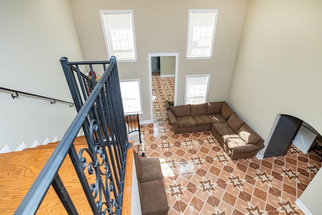 living area featuring baseboards