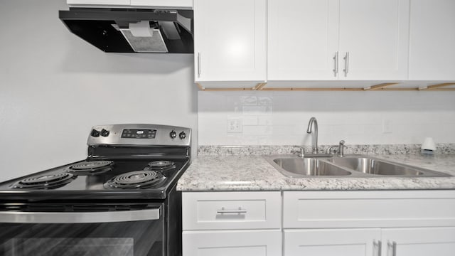 kitchen featuring a sink, ventilation hood, white cabinetry, backsplash, and range with electric stovetop