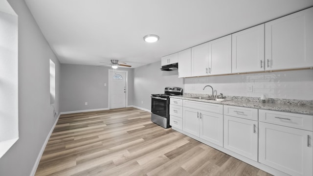 kitchen with ventilation hood, white cabinets, a sink, and stainless steel electric range