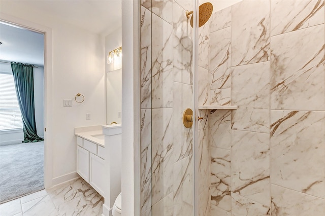 full bath featuring marble finish floor, a marble finish shower, toilet, vanity, and baseboards