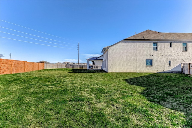 view of yard featuring fence