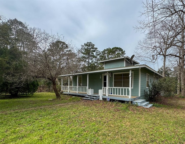 view of front of house with a front lawn and a porch