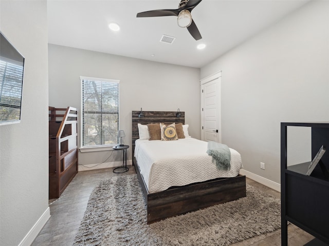 bedroom featuring a ceiling fan, recessed lighting, visible vents, and baseboards