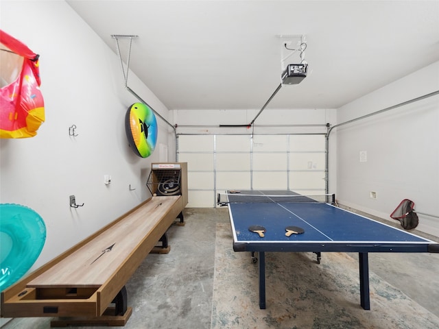 playroom with a garage and concrete flooring