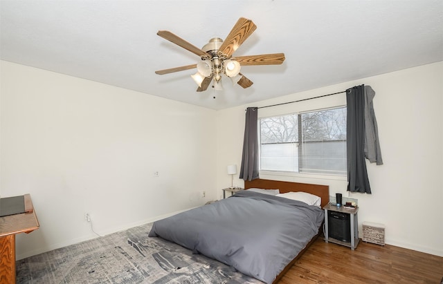 3003 Pierre Pl, College Station, TX 77845 - bedroom featuring a ceiling fan and wood finished floors