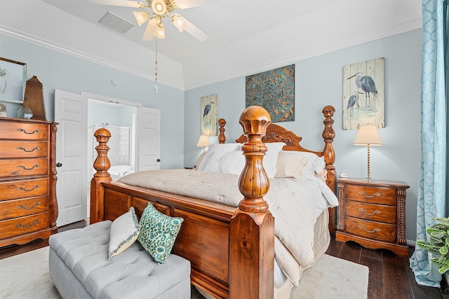 bedroom featuring dark wood-style floors, visible vents, and a ceiling fan